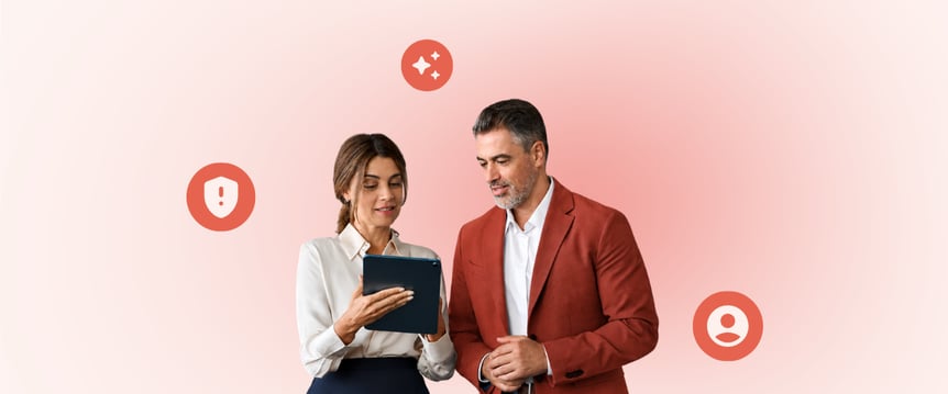 Two funeral directors looking at tablet