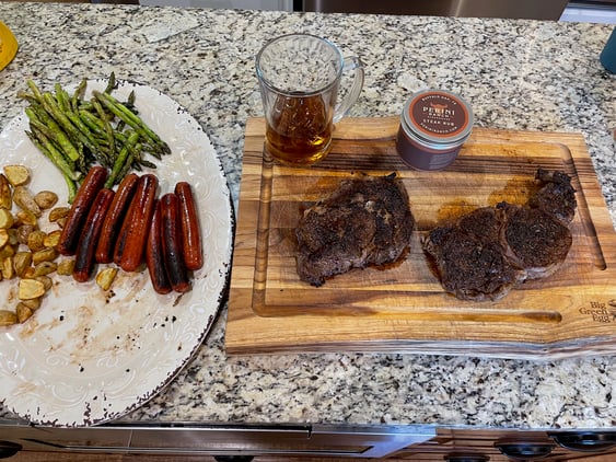 Ribeye meal with potatoes, beer and asparagus